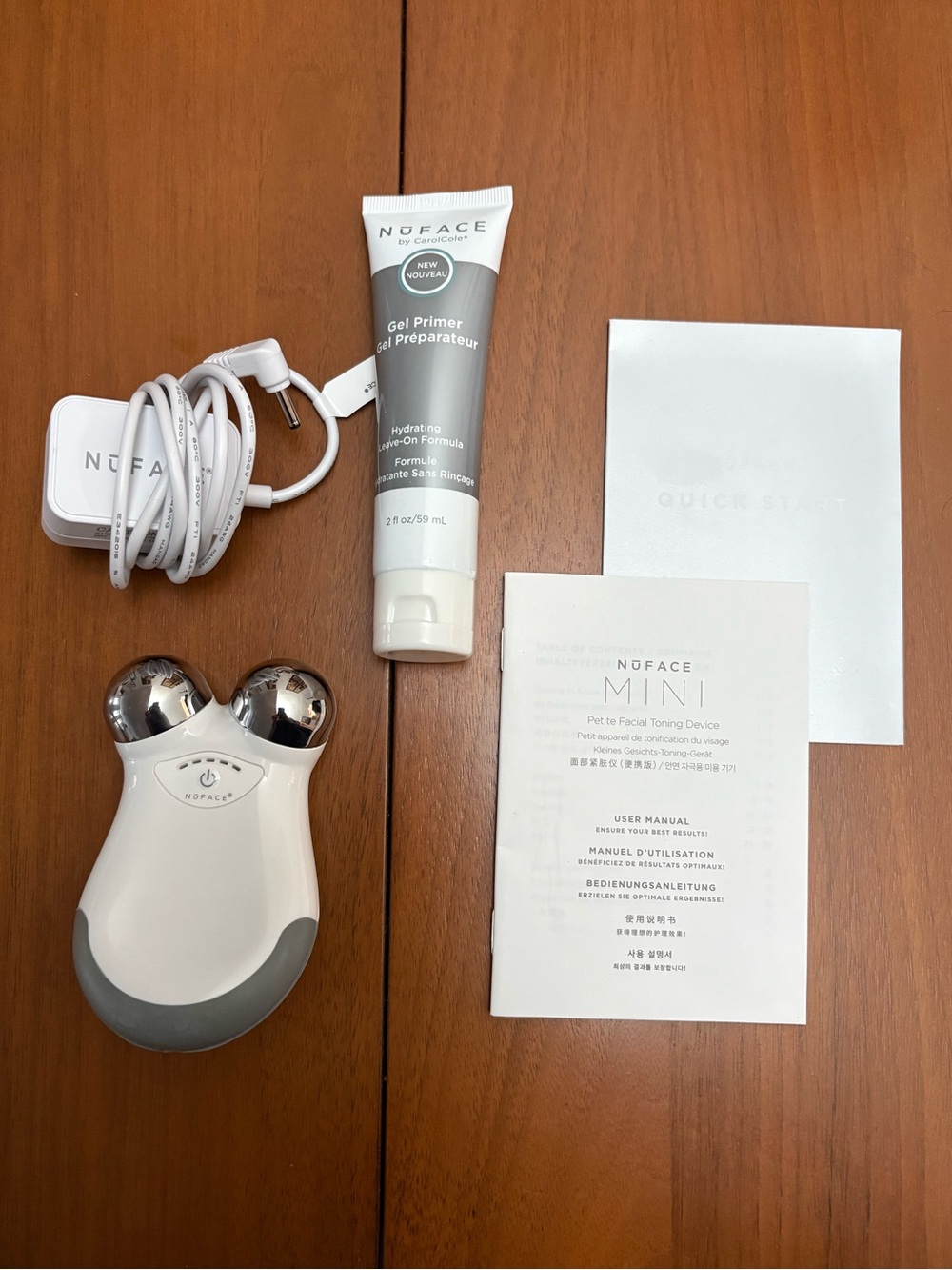 NWOT NuFace Mini microcurrent device w/ full-size electro gel